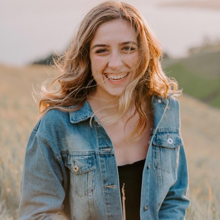 Kaveri Mehta, Lead Design Curator at Summit Mirror Cafe, reviewing corporate floral arrangements